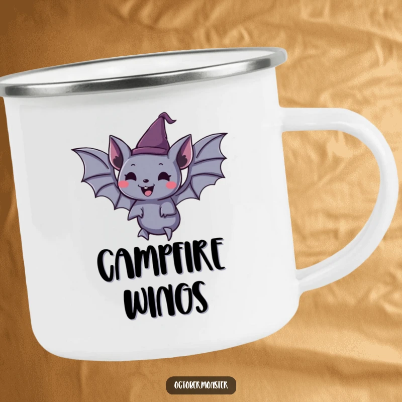 Funny spooky bat wearing a tiny pointed hat, joyfully floating, on a sturdy enamel camping mug, for outdoor enthusiasts.