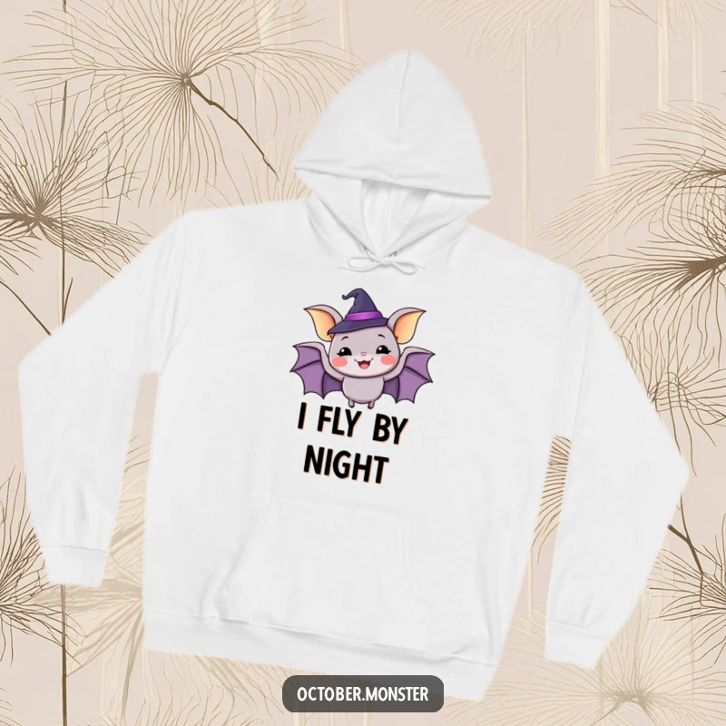 Funny happy bat wearing a tiny witch hat, flapping with glee, cozy and humorous hoodie.